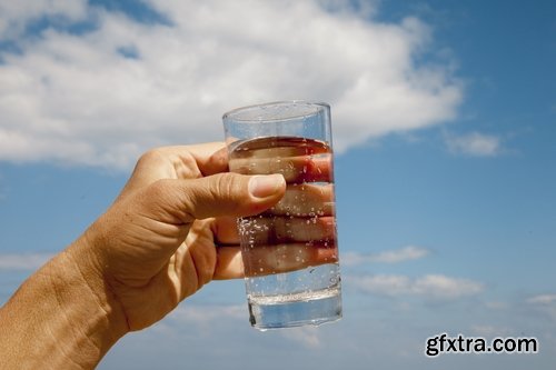 People man woman drinking a glass of clear water glass of liquid 25 HQ Jpeg