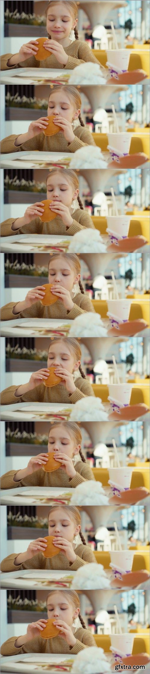 Girl Eating Burger In The Fast Food