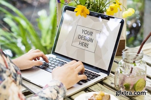 Woman using a laptop Mockup