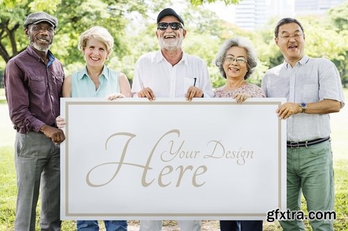 Senior Adult Friendship holding banner together