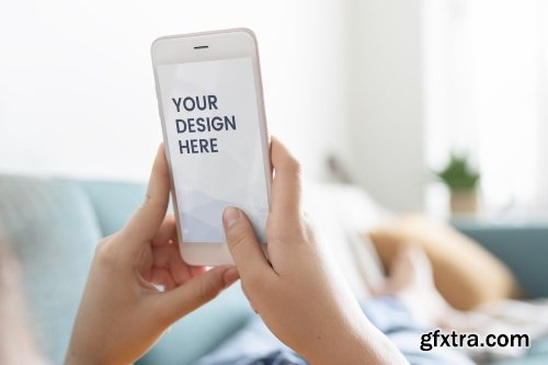 Girl unlocking her smart phone mockup