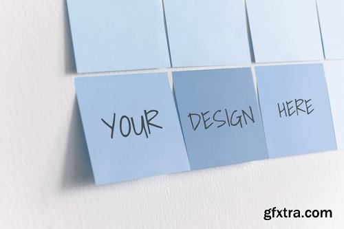 Blue sticky note mockups on a white wall