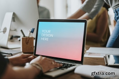 Office worker working on a laptop mockup