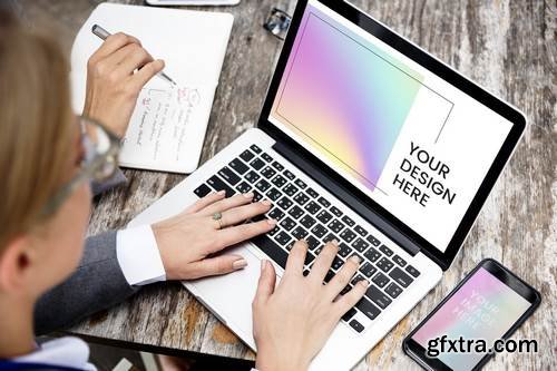 Businesswoman working on a laptop mockup