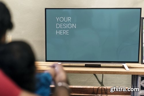 Family watching Mockup TV at home