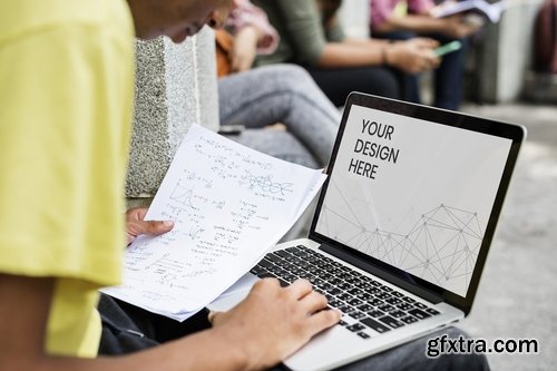 Student doing homework on his mockup laptop