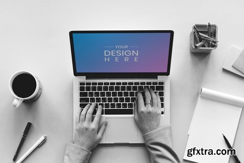 Woman working on mockup laptop screen