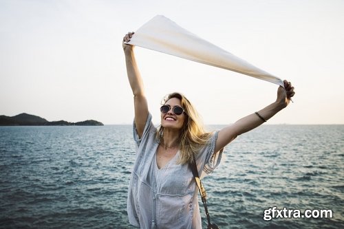 Woman Relaxing And Holding White Flag Mockup