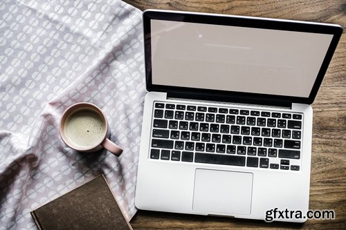 Laptop On Wooden Table And A Cup Mockup