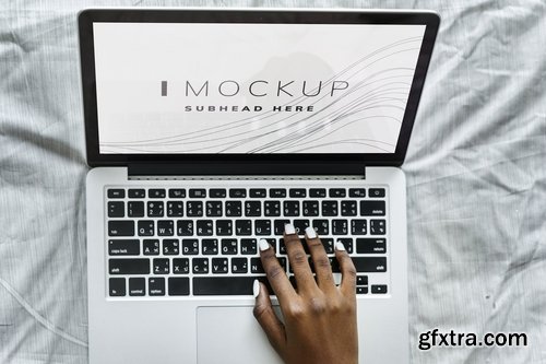 Aerial view of woman using laptop mockup screen