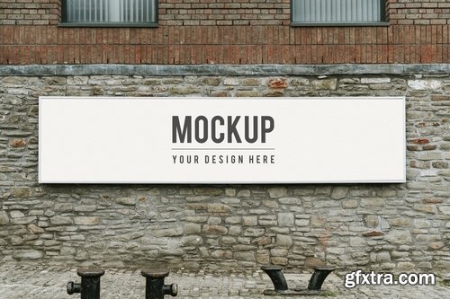 Rectangular public signage mockup on a brick wall