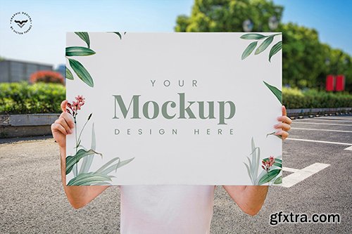 Man Presenting Poster Mockup