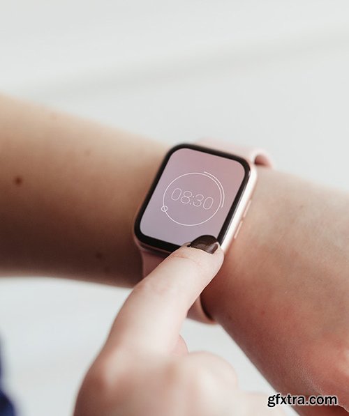 Woman looking at the time on her digital smartwatch mockup 1209114