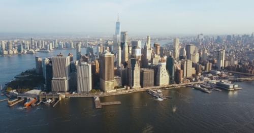 Aerial View of Busy New York City in America, Manhattan District on the Shore of East River - FEJKNRC