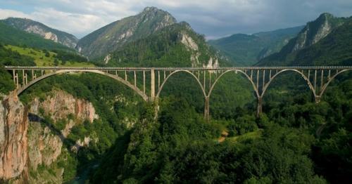 Aerial View of Durdevica Tara Arc Bridge in the Mountains - WHT5A4S