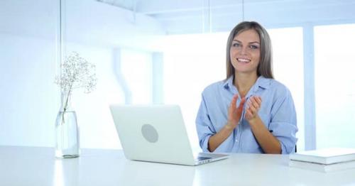 Applauding Beautiful Woman at Work in Office, Clapping - NSF3G9K