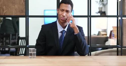 Businessman Attending Phone Call - EXBH586