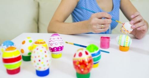 Woman Painting Easter Egg At Home - ZDCSEB8