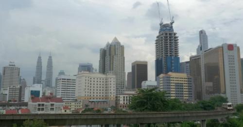 View Of Train On The Foreground And Modern Buildings Skyscraper On The Background. Kuala Lumpur - MDNWAH5