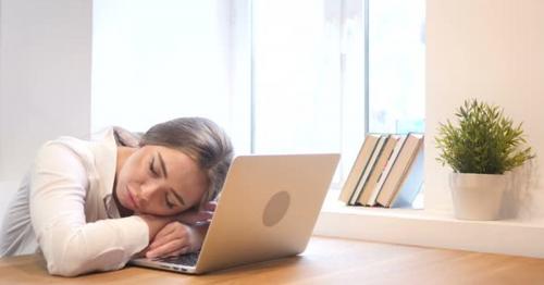 Young Girl Sleeping on Desk - FT7L5NA