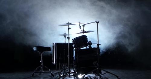 Set of Drums, Cymbals and Other Percussion Instruments. Black Smoky Background. Back Light. - NMJV2UH