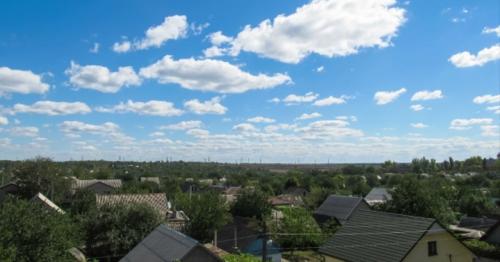 Clouds In The Sky Moving Over The Houses In The City - TV7H3KZ