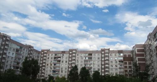 Clouds Moving Over The Multistorey Buildings. - QAPLVUE