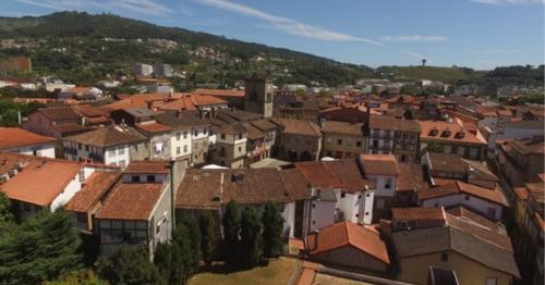 Flying Over Wonderful Historical City Center (Guimarães) - XAWDC3J