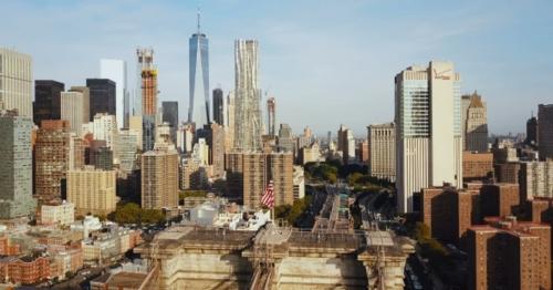 Aerial View of New York, Manhattan District with Skyscraper. Dronw Flying Over the Brooklyn Bridge - MUPAKHF