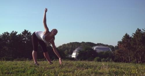 Female Warming - Up Muscles At The Open Air - G3ETAN8