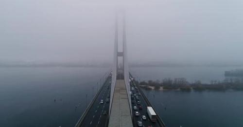 Aerial View of South Subway Cable Bridge in the Fog - TBGMWQ6