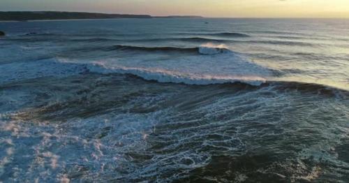 Aerial View on Big Ocean Waves and Sunset Sky - F26CSZM