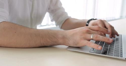 Man Typing On The Keyboard In The Office - 2MUJSFD