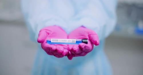 Videohive - Researcher Holding Covid-19 Sample Tube in Hand