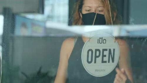 Videohive - Woman Closes Her Cafe for Quarantine