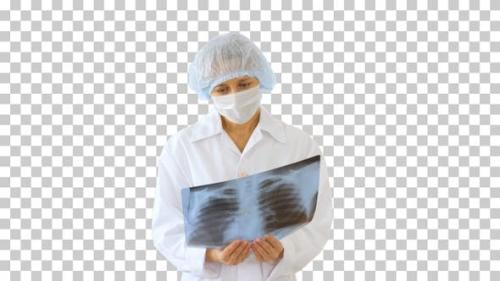 Videohive - Female doctor wearing medical mask looking, Alpha Channel