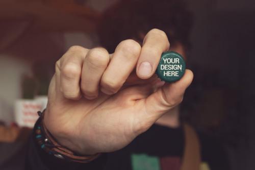 Front View Hand Beer Cap Mockup Premium PSD