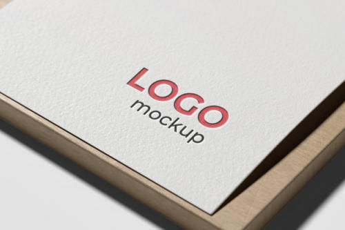 Logo Mockup On White Paper Premium PSD