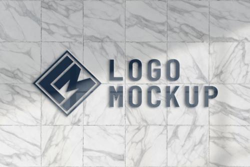 Reflecting Logo On Office Marble Wall Mockup Premium PSD