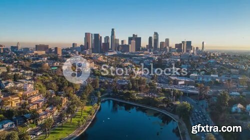 Videoblocks - Cinematic urban aerial timelapse of downtown Los Angeles skyline with freeway traffic | Footages