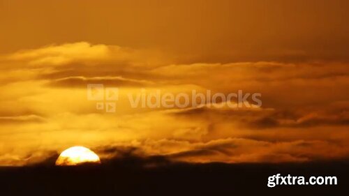 Videoblocks - Cloudy Sunrise Time Lapse | Footages