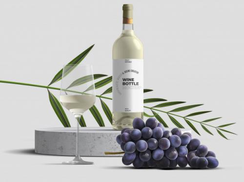 Wine Bottle Mockup Template With Grapes And Leave Premium PSD