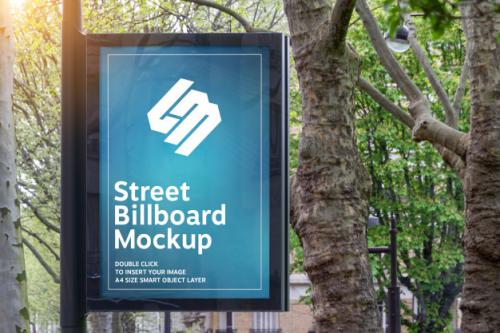Billboard In A City With Natural Landscape Mockup Premium PSD