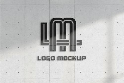 Reflecting Logo On Office Concrete Wall Mockup Premium PSD