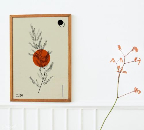 Wooden picture frame hanging on a white wall mockup - 2096973