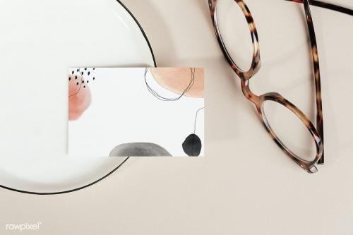 Business card on a plate with glasses mockup - 2254622