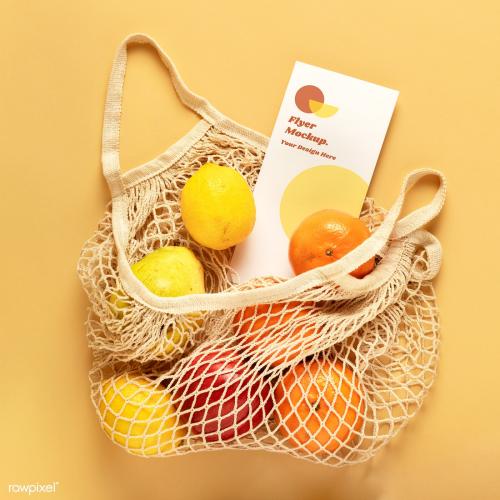 Flyer mockup in a reusable net bag with fruits - 2276534