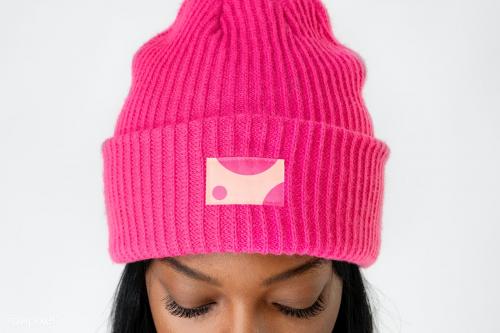 Black woman wearing a hot pink beanie mockup - 2288173