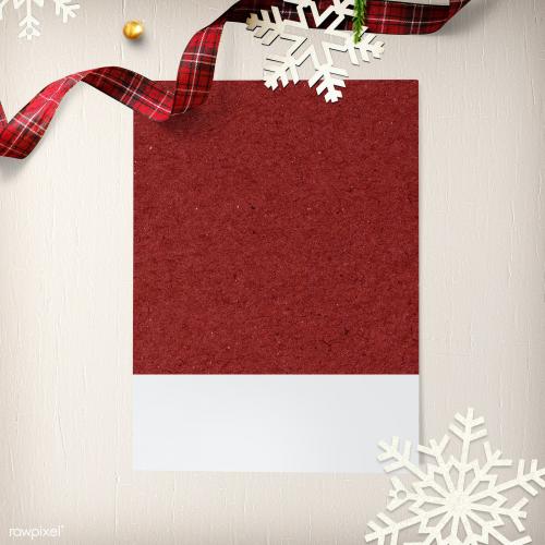 Blank photo frame mockup with Christmas decorations on cream background - 1232329