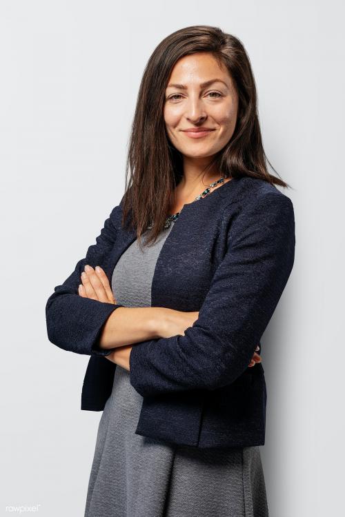 Happy businesswoman with arms crossed - 2019935